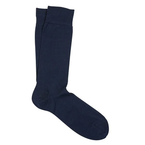 Chaussettes habillées pour homme : un guide montréalais pour la saison où l'on se déchausse à la porte