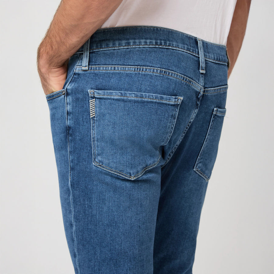 Mid-wash blue straight fit stretch denim five-pocket jeans by PAIGE, Bushman Federal style