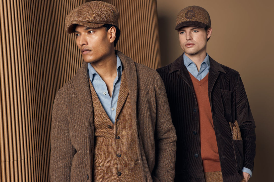Two men in Gran Sasso fall knitwear and tweed with flat caps - Boutique Jacques Montreal